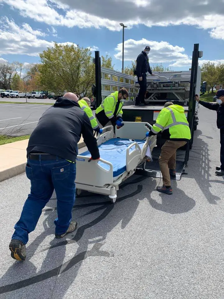 Photo of EMS employees at work