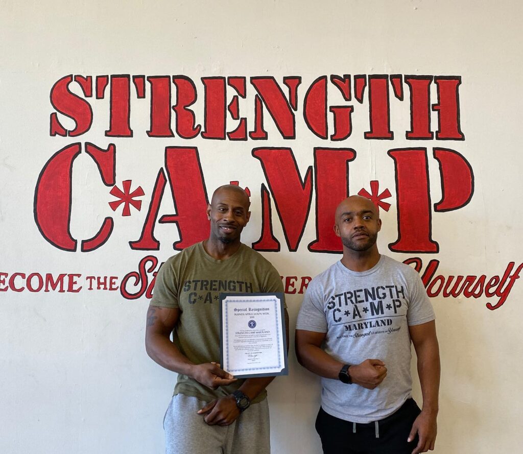 photograph of the owners of strength camp