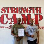 photograph of the owners of strength camp