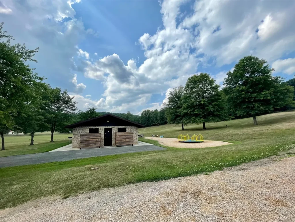 Photo of restrooms and playground at Camp Harding Park