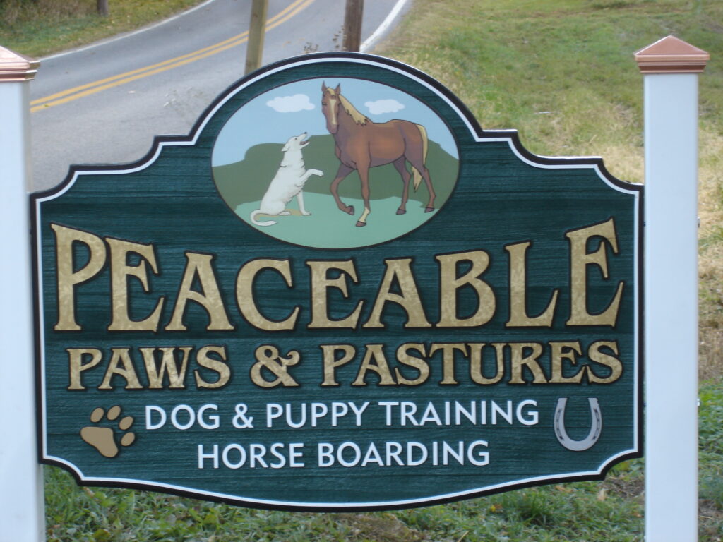 peaceable paws & pastures entrance sign